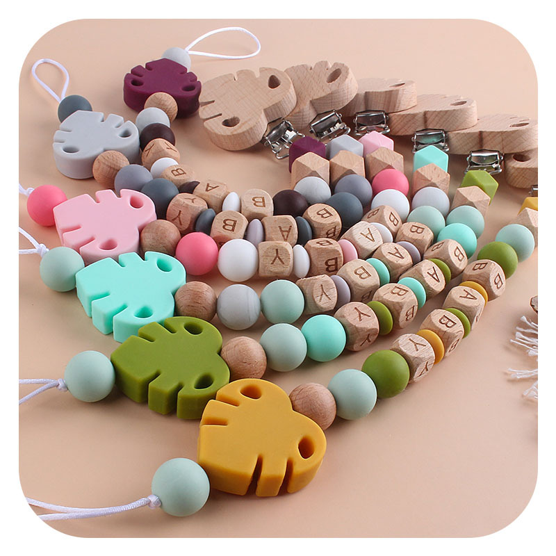 Nombre del bebé personalizable Cadena de chupete de hoja de silicona Bebé suministros de haya hoja chupete clip juguete mordedor
