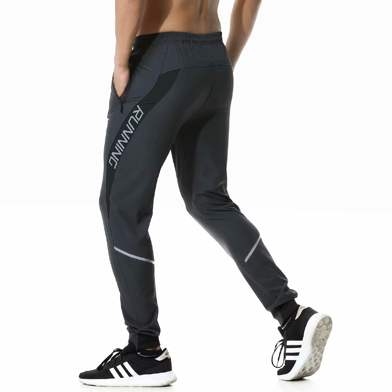 2022 verano nueva moda deportes pantalones sueltos de los hombres pantalones transpirables delgados casuales al aire libre pantalones elásticos al por mayor