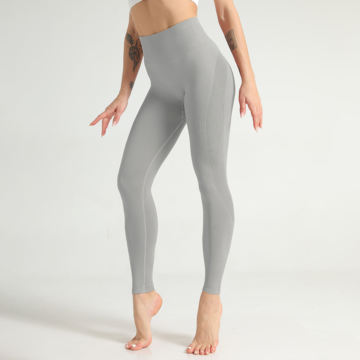 Pantalones de yoga sin costuras ajustados de cintura alta y alta elasticidad para levantamiento de cadera NSNS86449