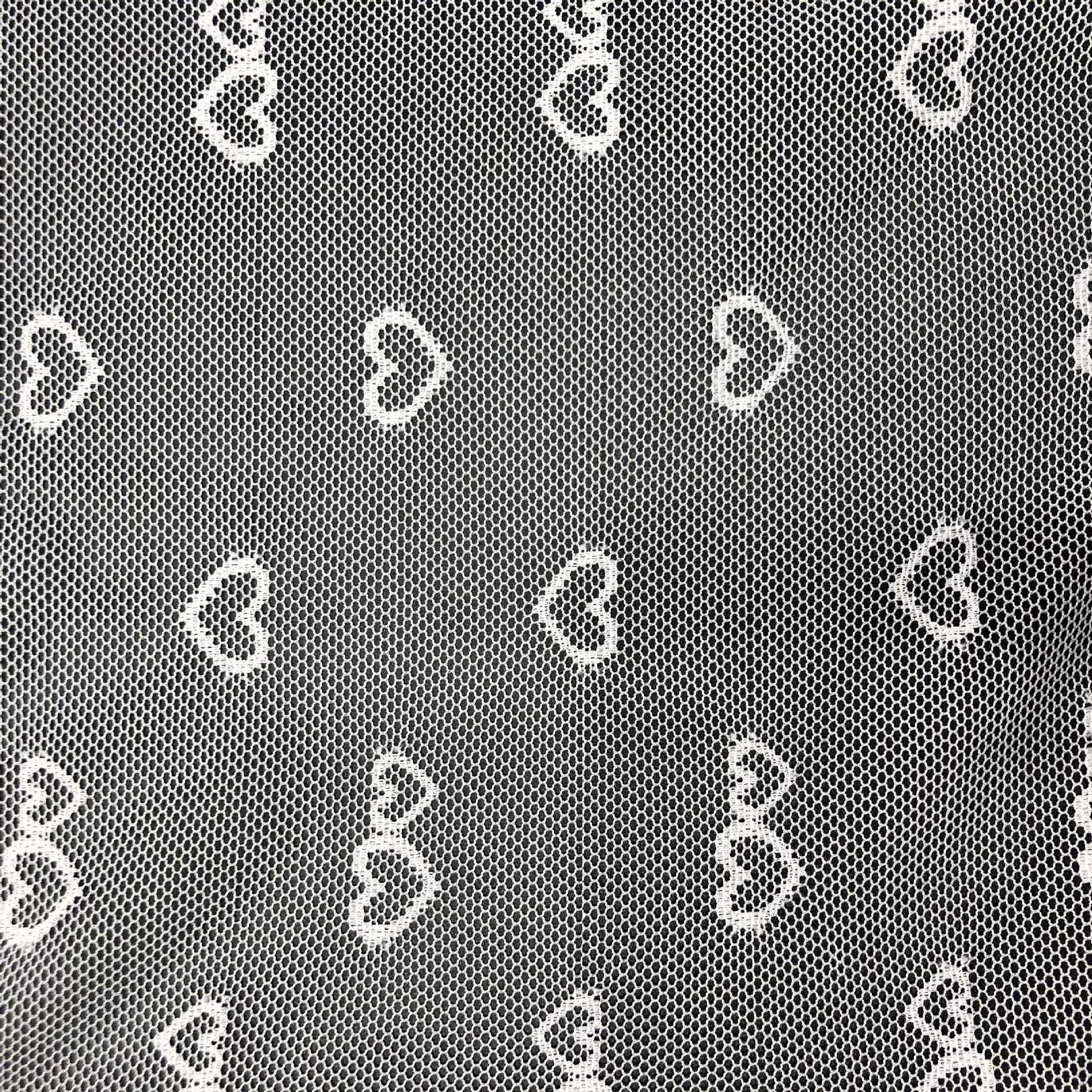 厂家供应 爱心网纱网眼布 服装网纱网布裙纱服装面料辅料