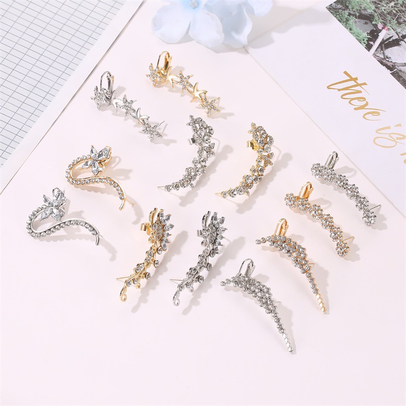 Pendientes europeos y americanos elegante diamante completo mariposa flor solo cristal clip de oreja Hipster pasarela discoteca oído espárragos oreja colgando