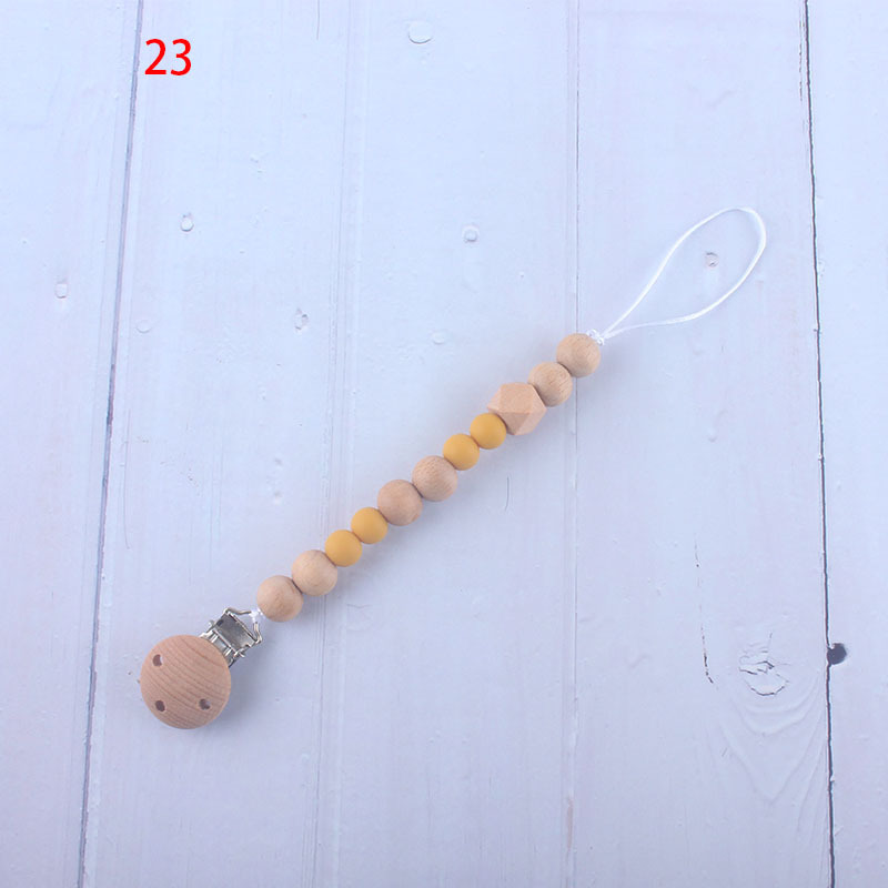 Nueva fábrica directa bebé Beech juguete mordedor bebé chupete de silicona pezón anti-gota cadena materna y infantil suministros