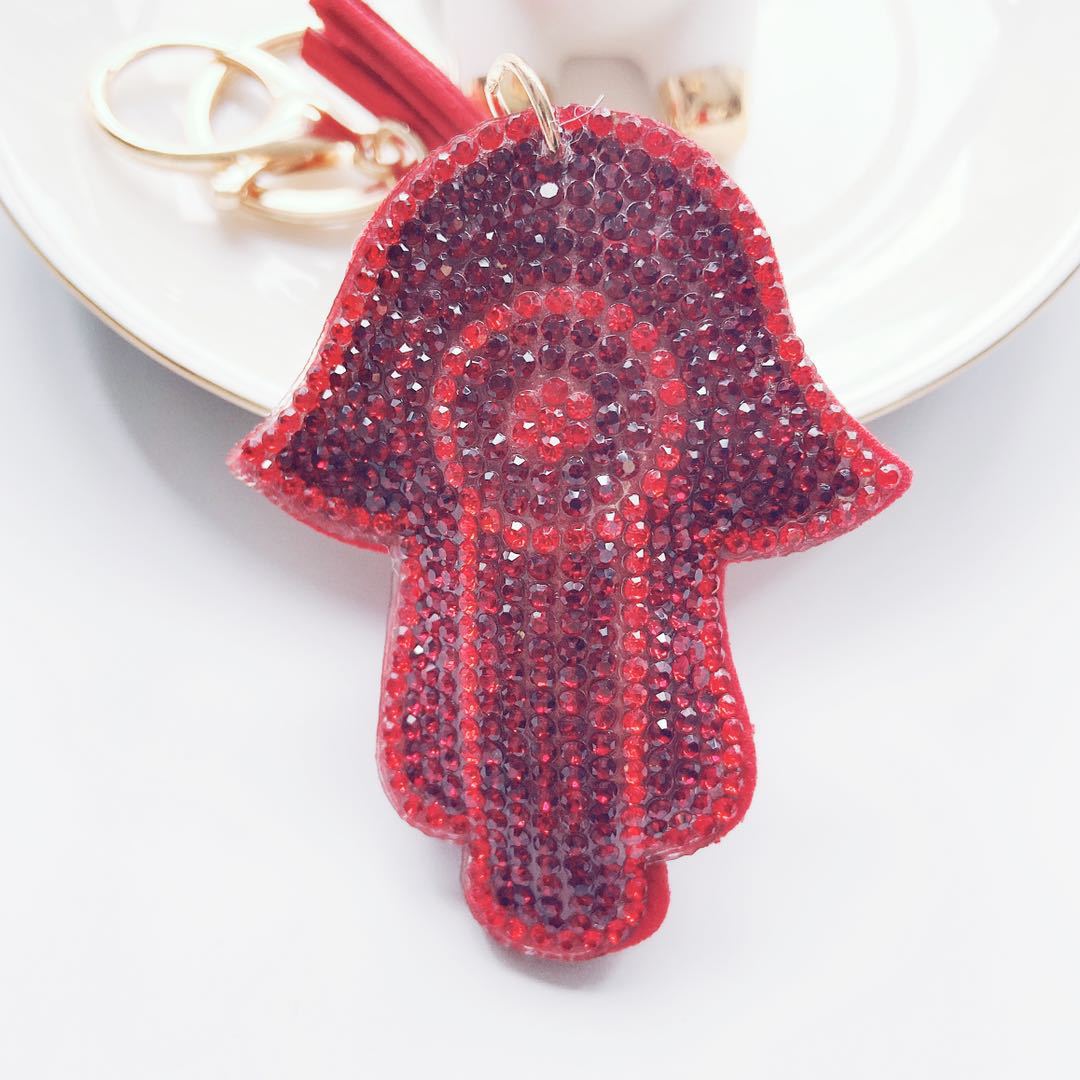 Venta caliente transfronteriza de Palma llavero coreano terciopelo rhinestone gato ojo llavero bolsa colgante accesorios en stock