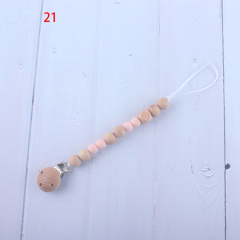 Nueva fábrica directa bebé Beech juguete mordedor bebé chupete de silicona pezón anti-gota cadena materna y infantil suministros