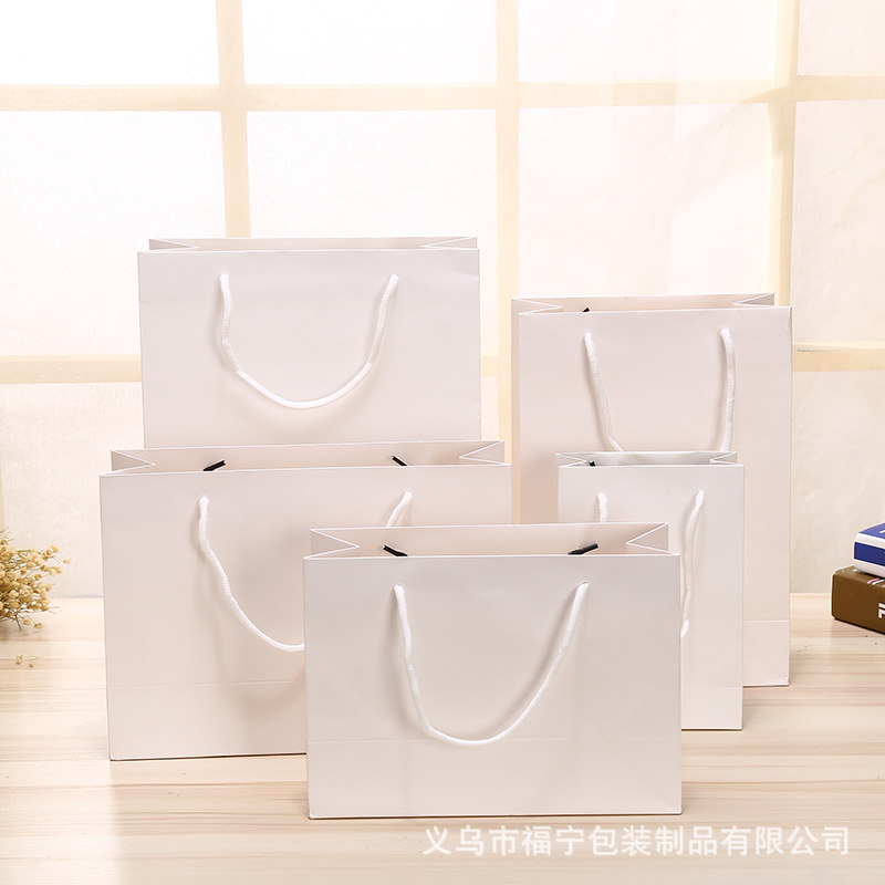 加厚纸袋定做服装购物手提袋白卡纸礼品包装袋子现货定制加印logo