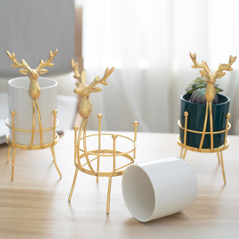 Estilo nórdico luz creativa de lujo de oro ciervos de hierro de cerámica maceta titular de la pluma de almacenamiento floral titular de la flor Decoración