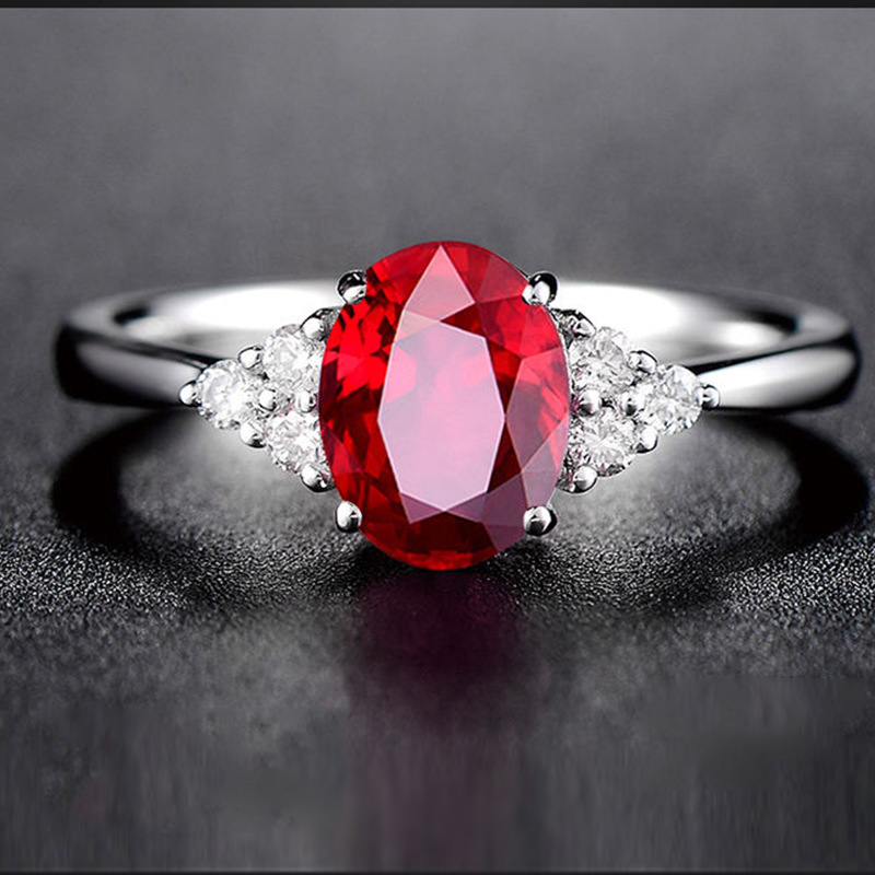 European and American hot elliptical red gem rings four-leg sapphire ring multi-color treasure live plummetic crystal drill