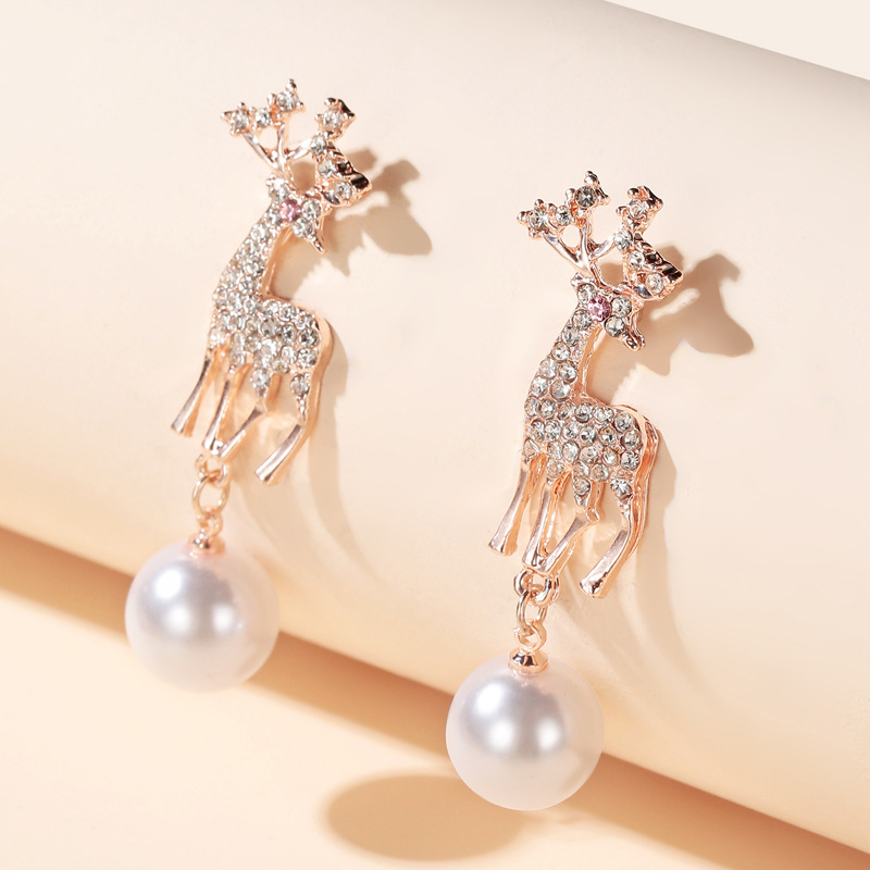 Korean Style Asymmetry Stars Elk Bow Pearl Earrings Simple Spread Wholesale Nihaojewelry display picture 8