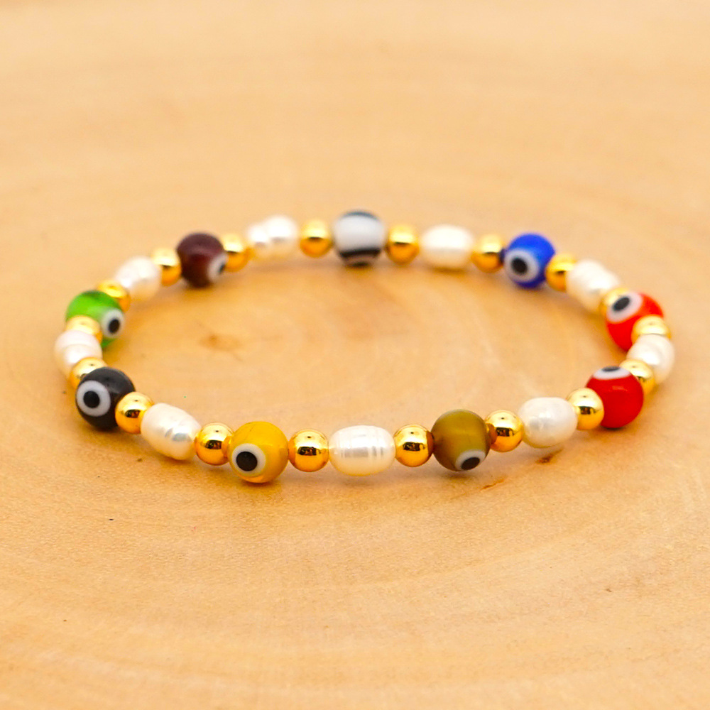 New Simple Baroque Pearl Glazed Evil Eye Ethnic Style Gold Bead Bracelet For Women Wholesale display picture 17