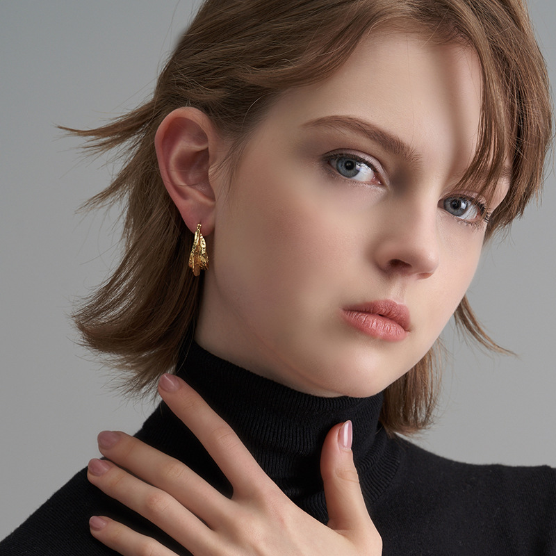 Retro Concave-convex Hammer Surface Metal Circle Irregular Three-dimensional Texture Earrings Wholesale display picture 2