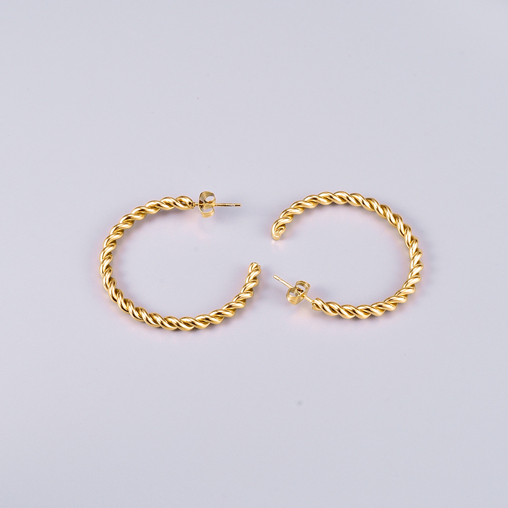 Wholesale Twist Circle Titanium Steel Gold Plated Earrings Nihaojewelry display picture 13