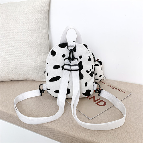 Harajuku style schoolbag female ins super popular cow pattern cute girl canvas bag Korean version soft girl children's backpack bag