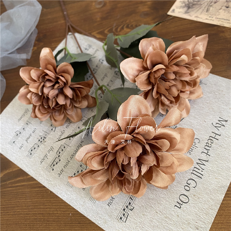 3 autumn colorful flowers