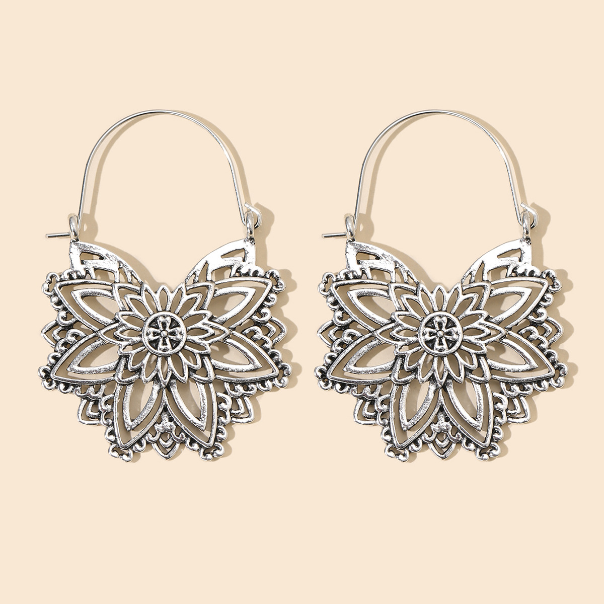 Bohemian Ethnic Carved Rotating Hollow Flowers Retro Earrings Wholesale Nihaojewerly display picture 31