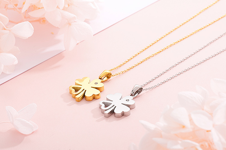 new stainless steel hollow four-leaf clover clavicle necklace earrings two-piece set wholesale