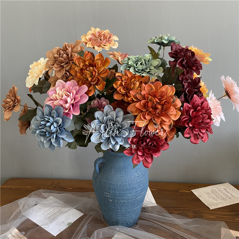 3 autumn colorful flowers