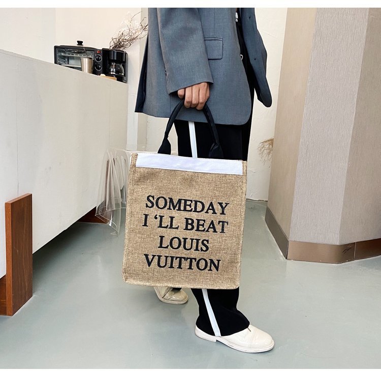 The 2020 autumn new handbag women's large-capacity Korean style lettered linen bag is a trend of large shopping bags for autumn and winter undefined