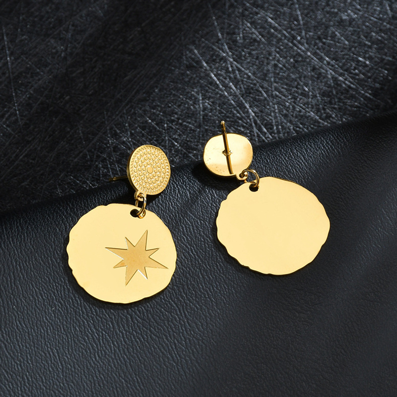 Aretes Redondos Con Estrella De Ocho Puntas display picture 4