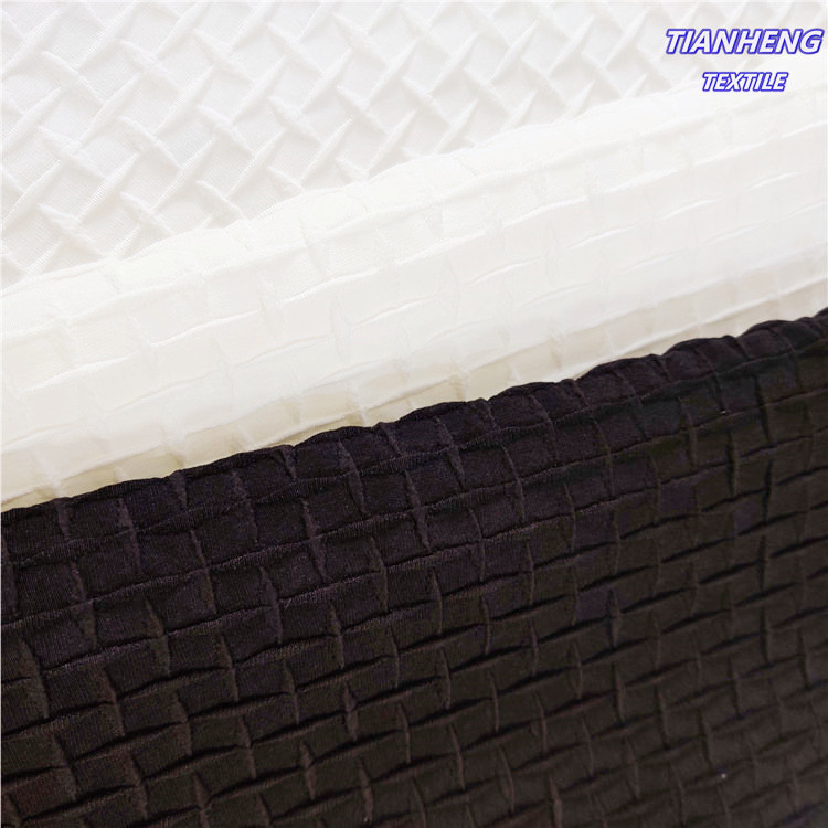 时尚时装西装外套女装童装衬衫连衣裙涤纶泡泡十字提花面料现货批