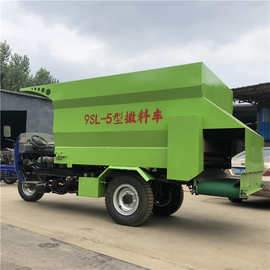 锡林郭勒盟养牛喂料车 搅拌一体撒料车图片 单人操作三轮喂料车