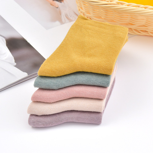 Japanese college style solid color socks for women in autumn and winter, mid-calf socks for women, versatile candy-colored cotton socks, Northeast cotton wholesale