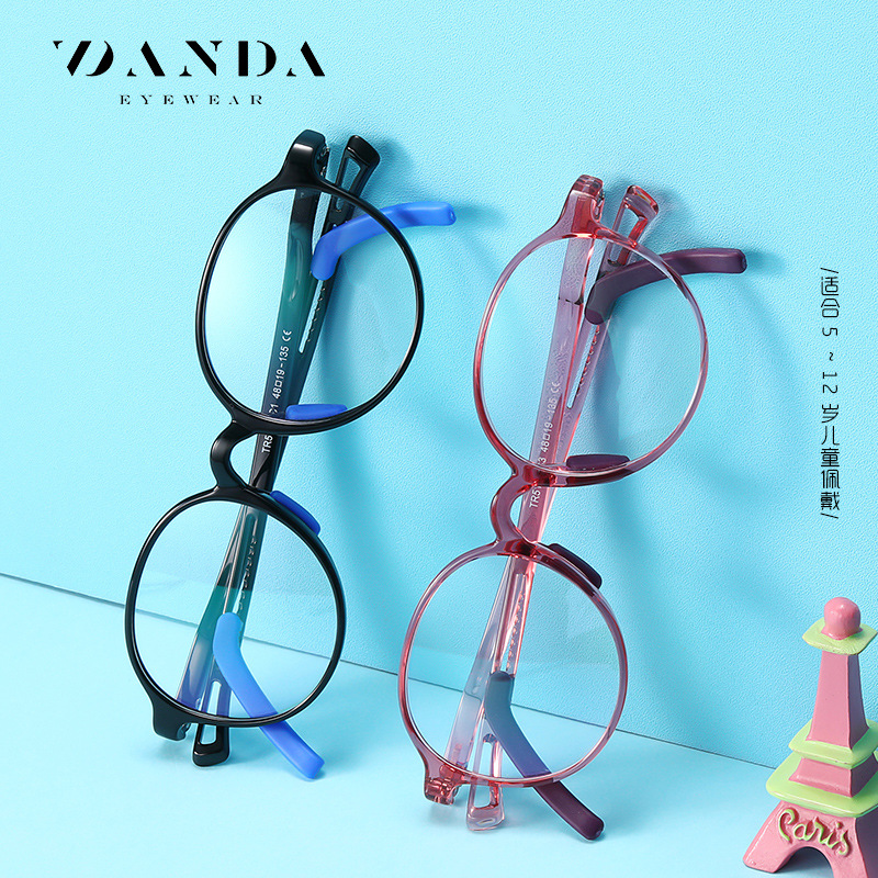 Nuevos niños anti-azul gafas de luz TR5115 niños y niñas de dos colores marco redondo gafas lisas con cubierta de pie antideslizante ajustable
