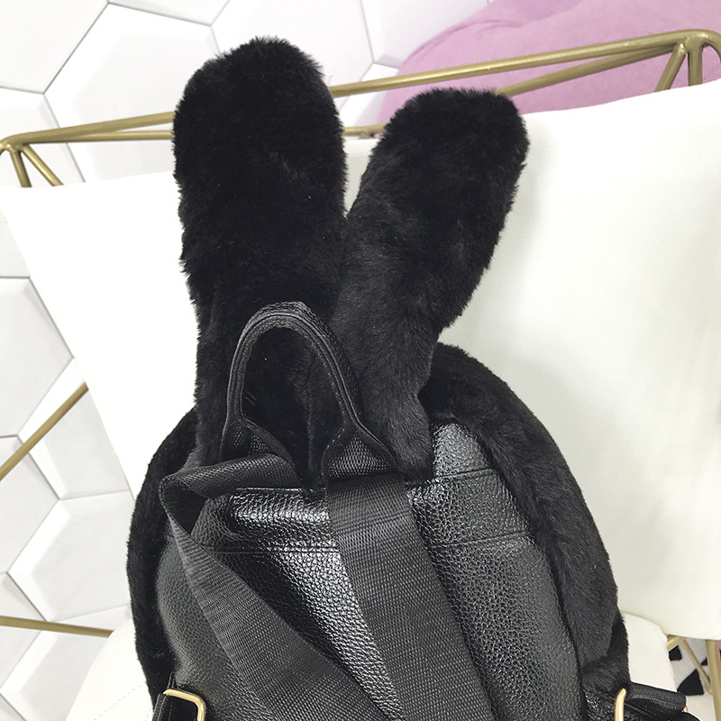 Mochila de moda para mujer de otoño e invierno con elegantes orejas de conejo, mochila escolar para estudiantes, suministro directo de fábrica, estilo nacional artístico.