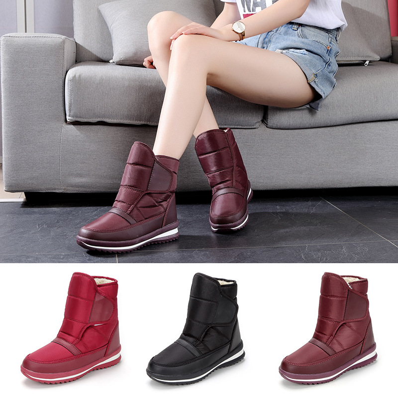 Botas de nieve para hombre y mujer, forradas de lana y engrosadas para invierno, de suela plana, talla un número más pequeña, venta al por mayor y al por menor de grandes fábricas, forradas de lana para mayor calidez.