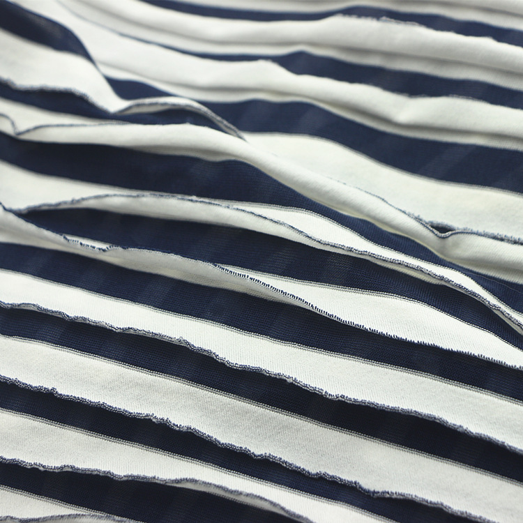 소 루버 창 천 니트 위축 니트 폴리 에스테르 물 용융 원사 염색 자카드 소 루버 천 여성용 스커트 패브릭