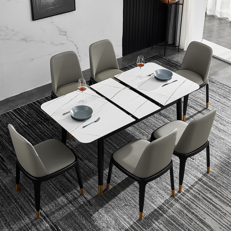 Italiano minimalista Placa de roca mesa de comedor y silla combinación simple moderno pequeño apartamento rectangular mesa de comedor retráctil una mesa cuatro sillas