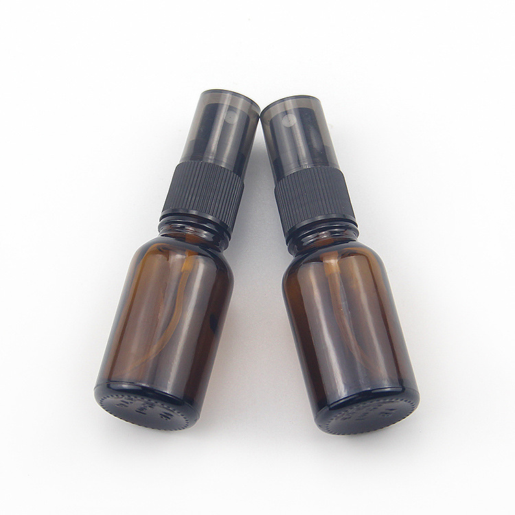 Manufacturers supply 15ml brown spray bottle cosmetics sub-packaging Brown essential oil bottle Press pump head small spray bottle