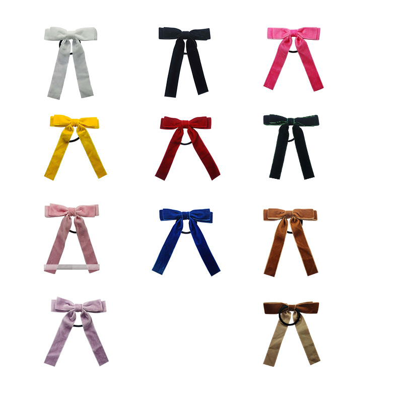 Multicoloured children's hair accessory with bow