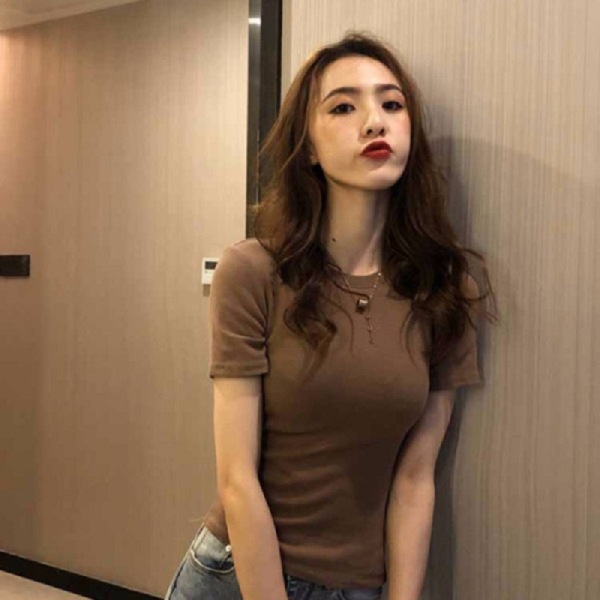 Camiseta de manga corta con cuello redondo y color sólido para mujer, novedad de verano 2025, estilo coreano, ajustada, ropa de mujer al por mayor para exportación