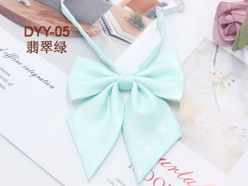Fabricante en stock niñas punta pluma raíz pajarita estilo coreano casual color sólido arco gran lunares JK uniforme collar flor