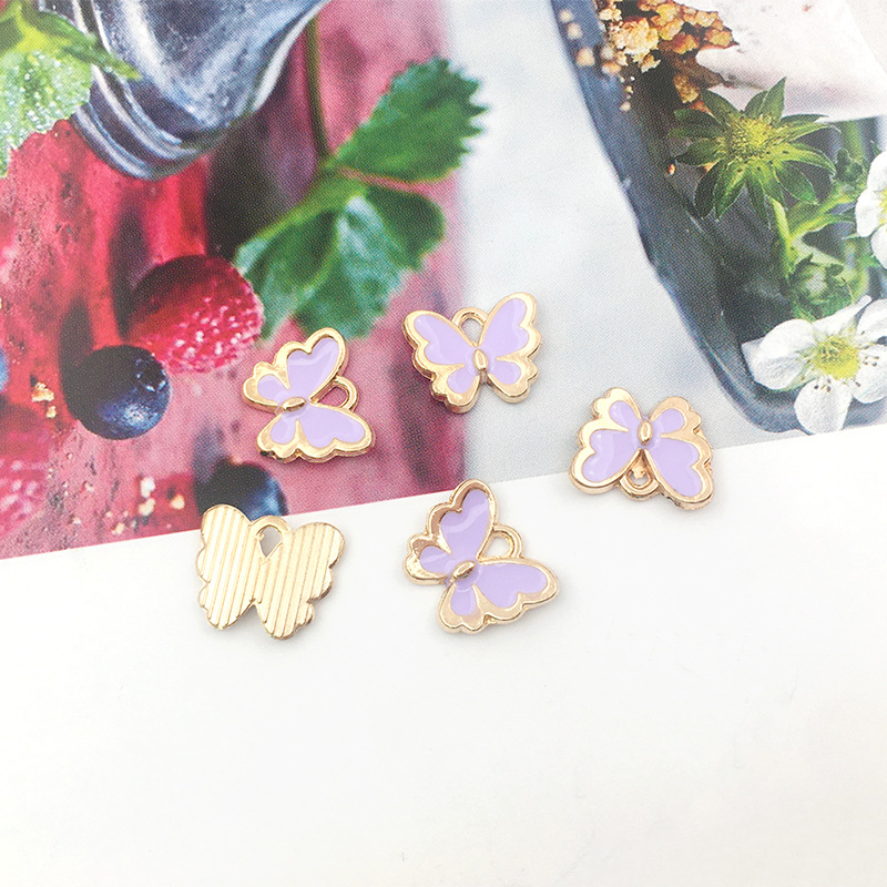 1 DIY accesorios de joyería hechos a mano goteando pequeña mariposa colgante collar pendientes pulsera colgante paquete de material