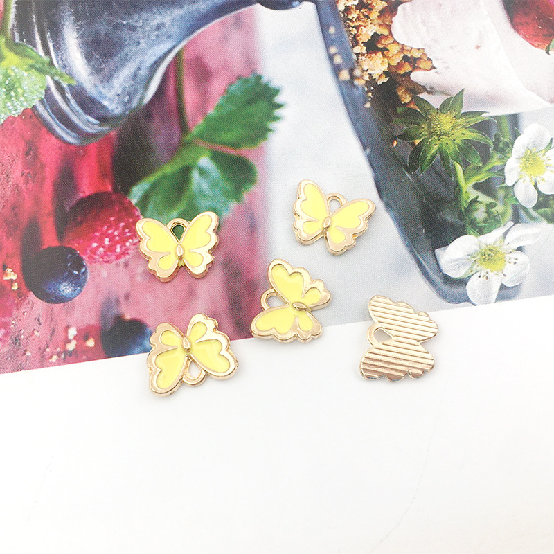 1 DIY accesorios de joyería hechos a mano goteando pequeña mariposa colgante collar pendientes pulsera colgante paquete de material