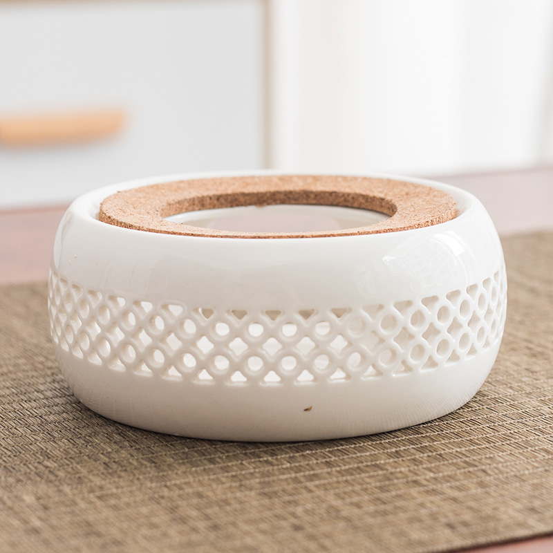 Yunhua estilo japonés hueco de la vela de calefacción calentador de té de base redonda calentador de té Dehua juego de té de cerámica