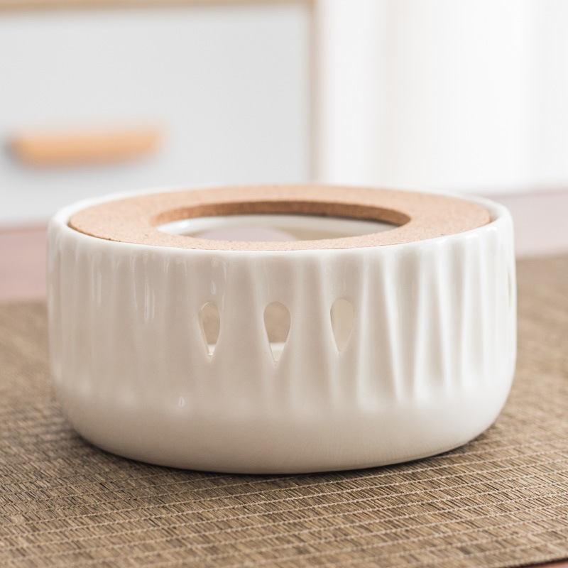 Yunhua estilo japonés hueco de la vela de calefacción calentador de té de base redonda calentador de té Dehua juego de té de cerámica