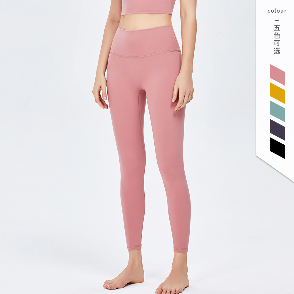 Nuevos pantalones de yoga de cintura alta desnuda europea y americana de las mujeres corriendo Pantalones deportivos sin vergüenza línea apretado cadera levantamiento fitness Pantalones