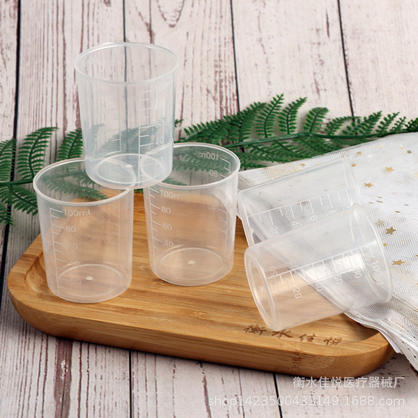 Plastic measuring cup odorless scaled