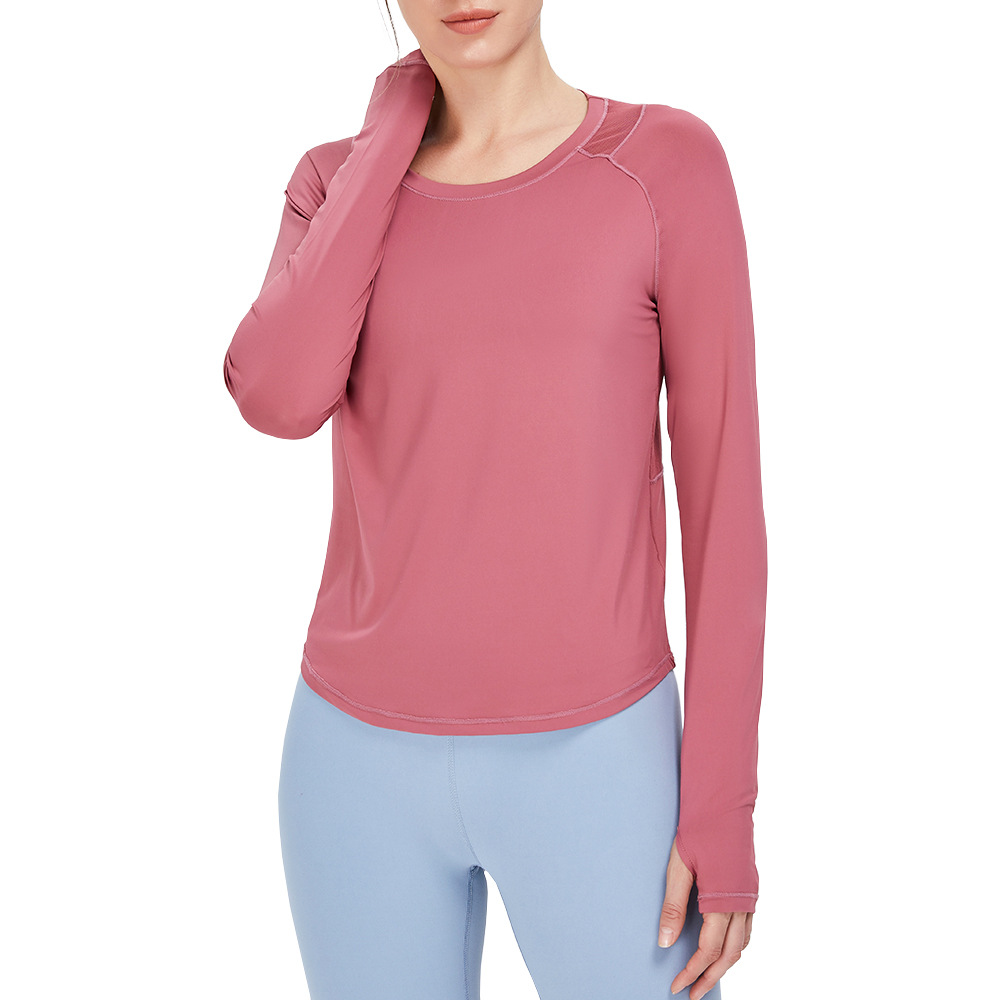 Otoño e invierno nuevo yoga europeo y americano camiseta deportiva de manga larga costura de malla de mujer versátil transpirable running fitness top