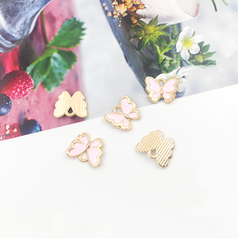 1 DIY accesorios de joyería hechos a mano goteando pequeña mariposa colgante collar pendientes pulsera colgante paquete de material