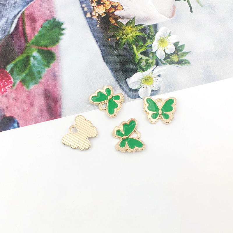 1 DIY accesorios de joyería hechos a mano goteando pequeña mariposa colgante collar pendientes pulsera colgante paquete de material