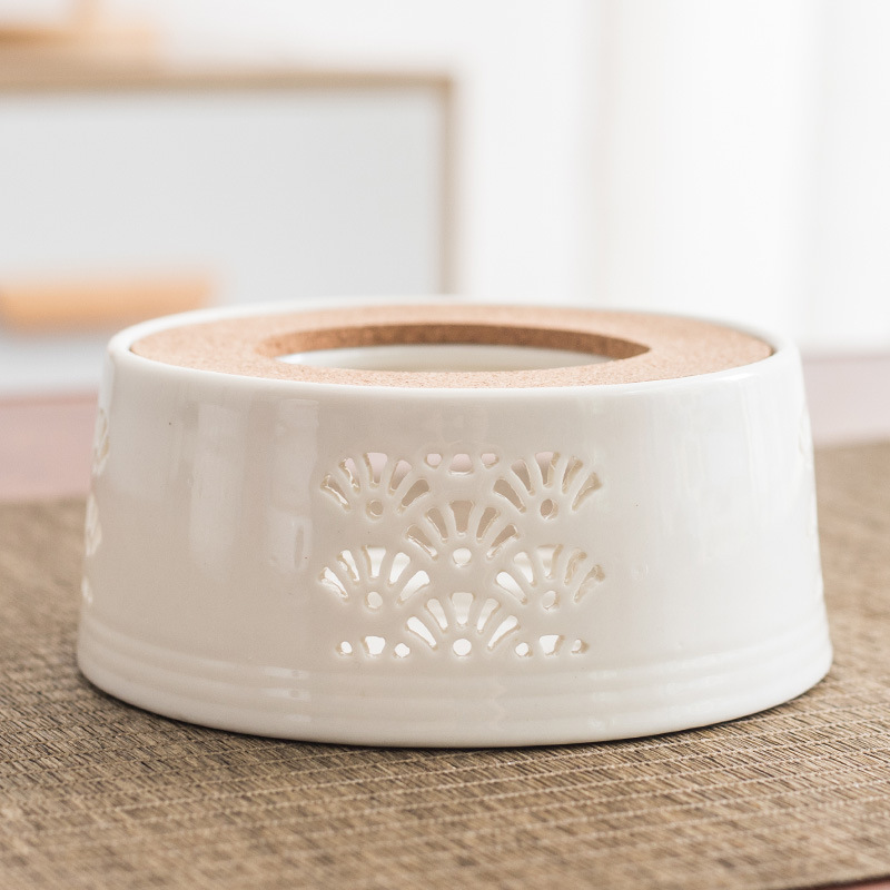 Yunhua estilo japonés hueco de la vela de calefacción calentador de té de base redonda calentador de té Dehua juego de té de cerámica