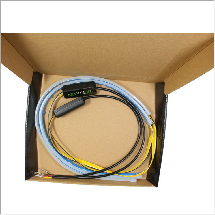Tira de guía de luz de silicona de dos colores ultrafina caballo de agua corriente luz amarilla con agua corriente Luz de lágrima luz decorativa del coche luz diurna