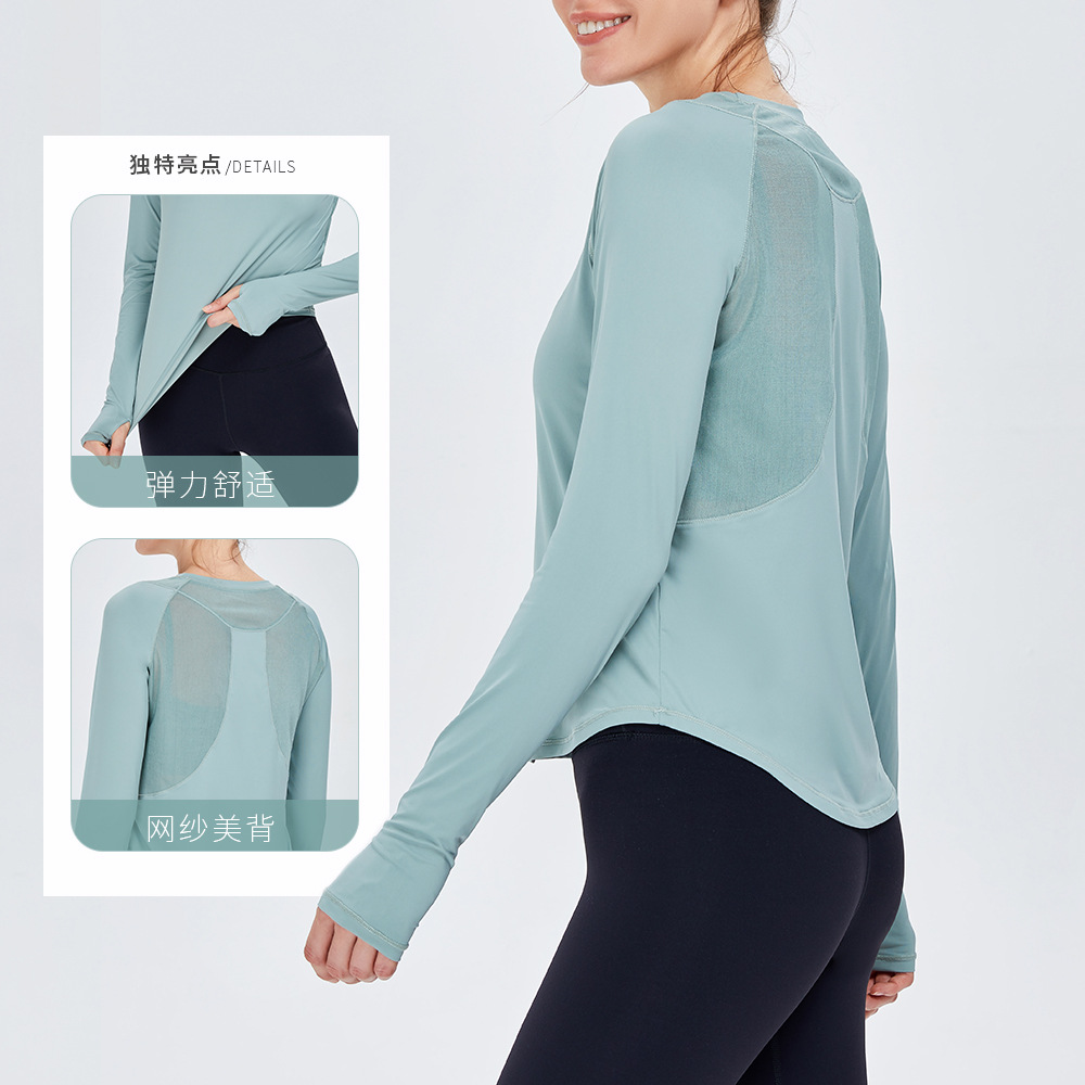 Otoño e invierno nuevo yoga europeo y americano camiseta deportiva de manga larga costura de malla de mujer versátil transpirable running fitness top