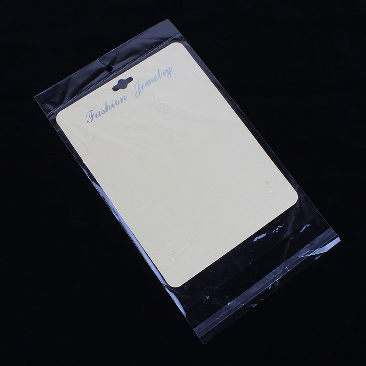 厂家直销  包装饰品透明opp袋子 15*26cm内空15*21 带挂头带胶