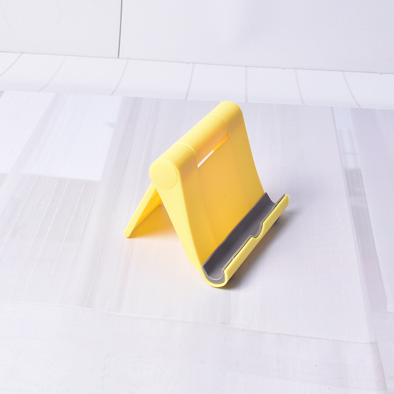 Soporte de teléfono móvil de plástico en stock tableta de teléfono móvil soporte plegable universal soporte de teléfono móvil de escritorio de publicidad impreso LOGO