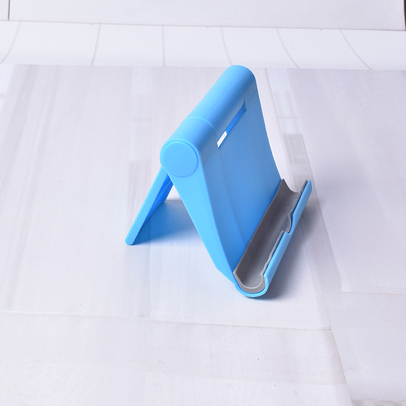 Soporte de teléfono móvil de plástico en stock tableta de teléfono móvil soporte plegable universal soporte de teléfono móvil de escritorio de publicidad impreso LOGO