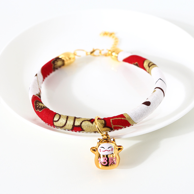 Japón y flores de viento para atraer la fortuna gatos campana de bronce ajustable mascotas gatos perros collares accesorios de comercio exterior